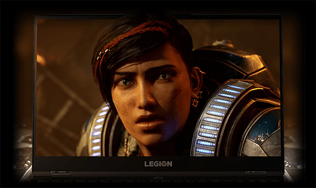 Auf dem Laptopbildschirm ist eine Frau mit einem Stirnband und futuristischer Kleidung zu sehen. Der Laptop ist von der Marke Legion.