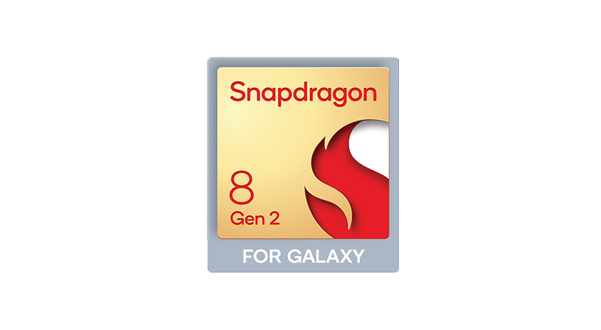 Nahaufnahme des Snapdragon 8 Gen 2 für Galaxy-Chipsatzes. Es hat rote und goldene Akzente auf einem grauen Hintergrund.