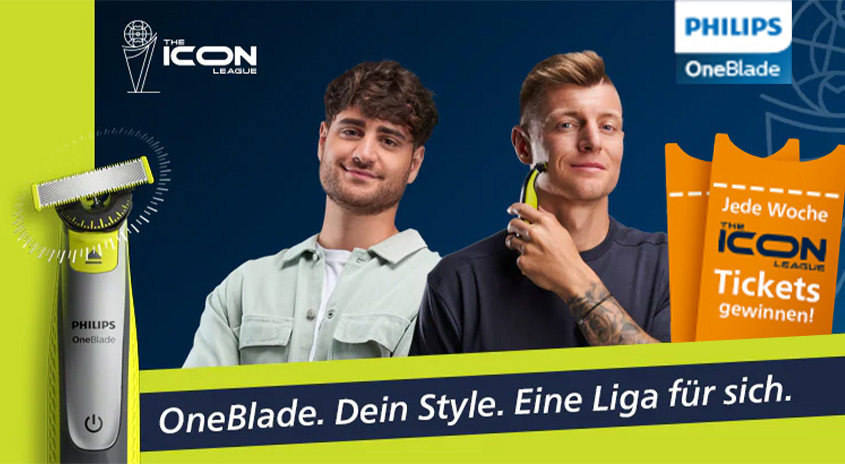 Eine Philips OneBlade Werbung mit zwei Männern und Eintrittskarten. Eine OneBlade Rasierer ist im Vordergrund.