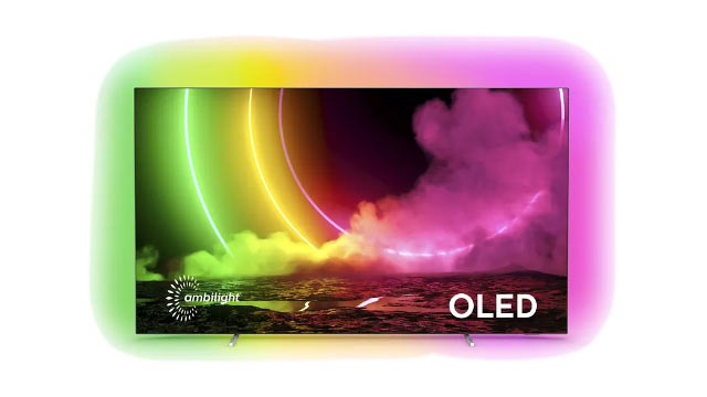 Ein OLED-Fernseher mit Ambilight zeigt abstrakte Grafiken in Grün, Gelb und Pink auf dem Bildschirm. Das Wort "OLED" ist sichtbar.