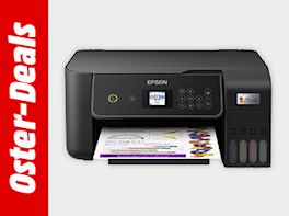 Bild mit grauem Hintergrund. Links davon steht "Oster-Deals" in weißer Schrift vor rotem Hintergrund. Rechts davon ein Drucker