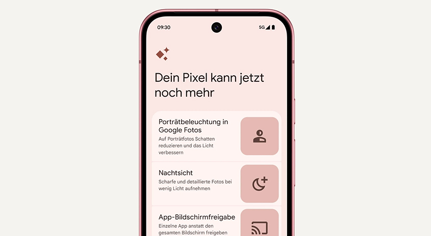 Nahaufnahme eines Pixel-Smartphones mit Text in Deutsch auf einem hellrosa Bildschirm.