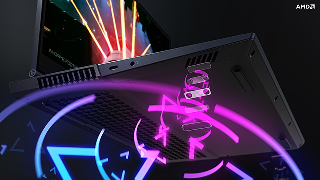 Ein Laptop mit AMD-Logo ist auf einem schwarzen Hintergrund zu sehen, der durch blau-violette und rote Lichteffekte hervorgehoben wird.