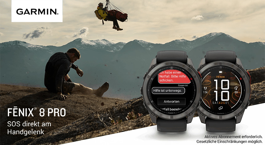 Garmin Fēnix 8 Pro: Bergsteiger in den Bergen, Rettung per Hubschrauber, im Vordergrund Smartwatch mit SOS-Notfallanzeige. Text: SOS direkt am Handgelenkt. Aktives Abonnement erforderlich.