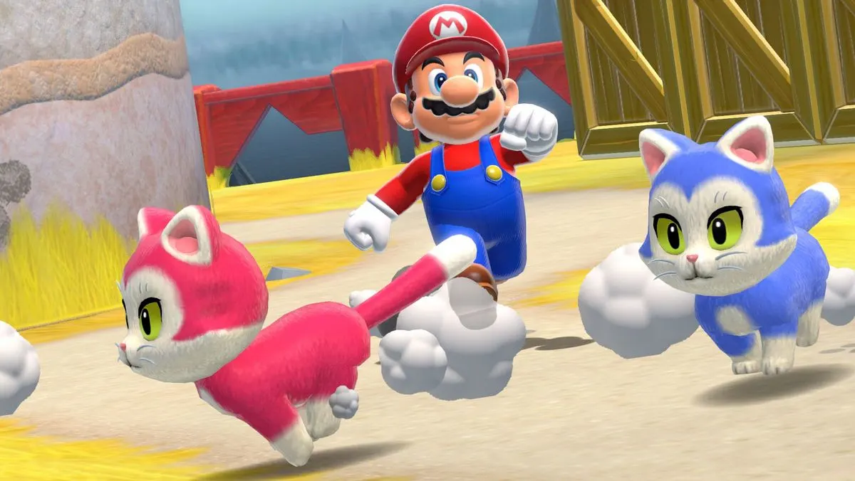 Super Mario rennt in bunter Spielewelt hinter einer pinken und einer blauen Katze her