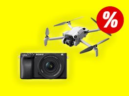 Kamera & Drohne vor gelben Hintergrund. Rechts oben im Bild ist ein großes Prozentzeichen zu sehen.