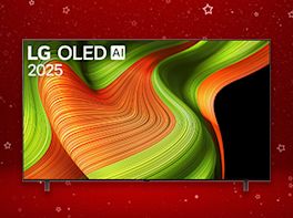 Produktbild eines TV-Geräts vor rot-weihnachtlichem Hintergrund.