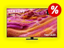 TV-Gerät vor gelben Hintergrund. Rechts oben im Bild ist ein großes Prozentzeichen zu sehen.