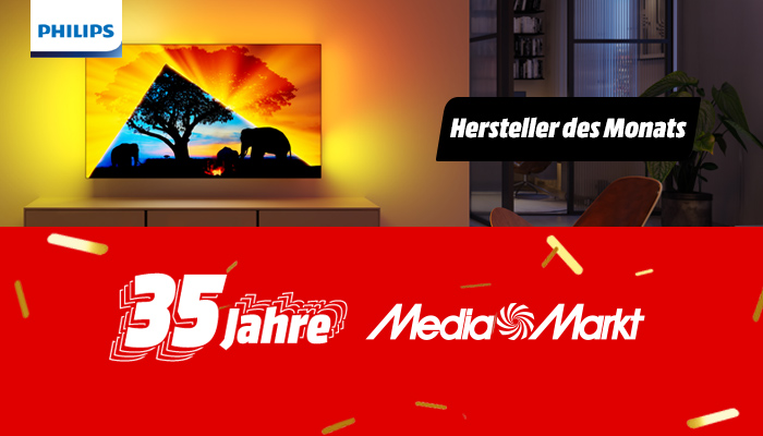 Ein Philips-Fernseher zeigt eine Silhouette von Elefanten und einem Baum bei Sonnenuntergang. Darunter steht "35 Jahre MediaMarkt" auf rotem Grund.