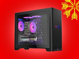 PC Rechner auf rotem Hintergrund, dekoriert mit gelber Schneeflocke in der Ecke.