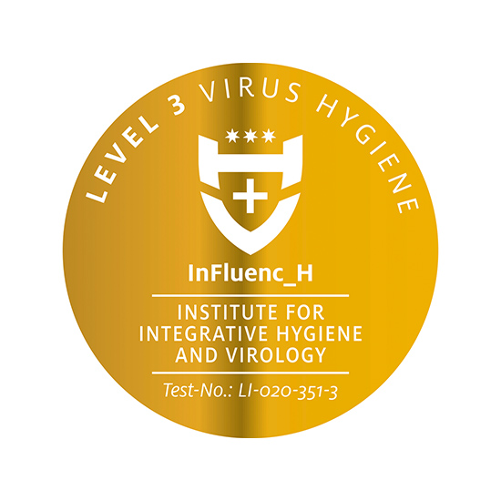 Goldene, kreisförmige Auszeichnung mit weißem Text und Symbolen, die Virus-Hygiene-Standards zertifizieren.