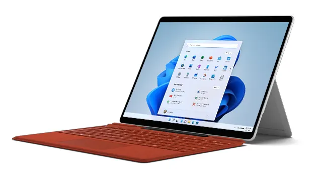 Ein Tablet-PC mit einem roten Tastaturcover steht auf einem weißen Untergrund. Auf dem Bildschirm wird ein Menü angezeigt.