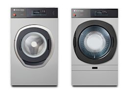 Das Bild zeigt eine Waschmaschine und einen Trockner von Schulthess
