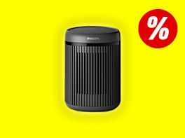 Heizlüfter vor gelben Hintergrund. Rechts oben im Bild ist ein großes Prozentzeichen zu sehen.