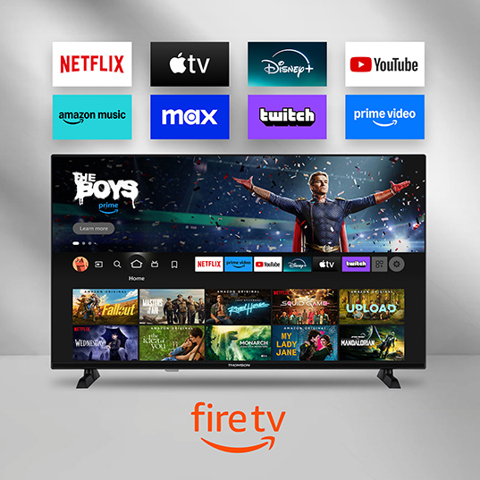 Ein Fire TV-Gerät zeigt Streaming-Apps wie Netflix, YouTube und Prime Video auf einem schwarzen Flachbildfernseher. Auf dem Bildschirm wird "The Boys" angezeigt.