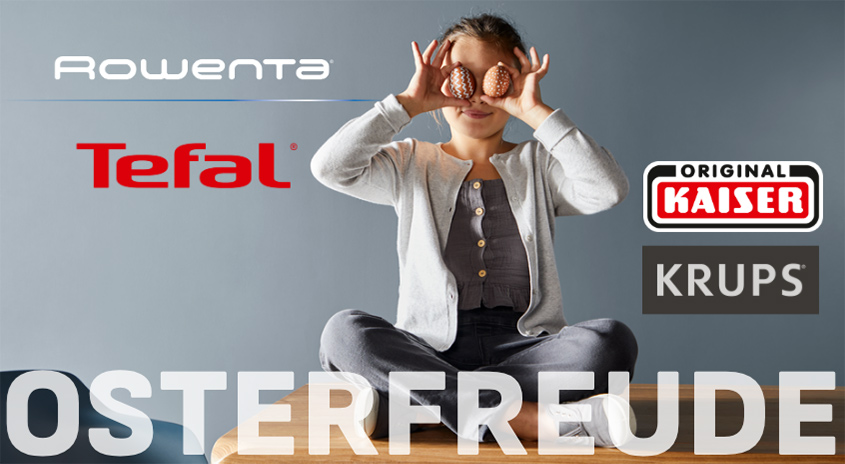 Kind sitzt lachend auf Tisch und hält bemalte Ostereier vor die Augen, daneben Markenlogos von Rowenta, Tefal, Original Kaiser und Krups, Schriftzug „OSTERFREUDE“.