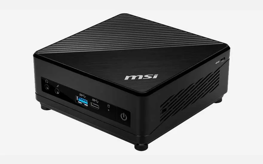Un mini-ordinateur noir MSI sur fond blanc, avec des ports USB, audio et d'alimentation visibles.