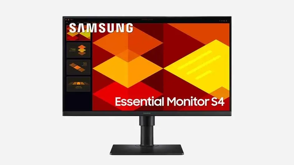 Samsung Essential Monitor S4 with black stand, displaying vibrant red and yellow geometric patterns on screen with brand logo visible.