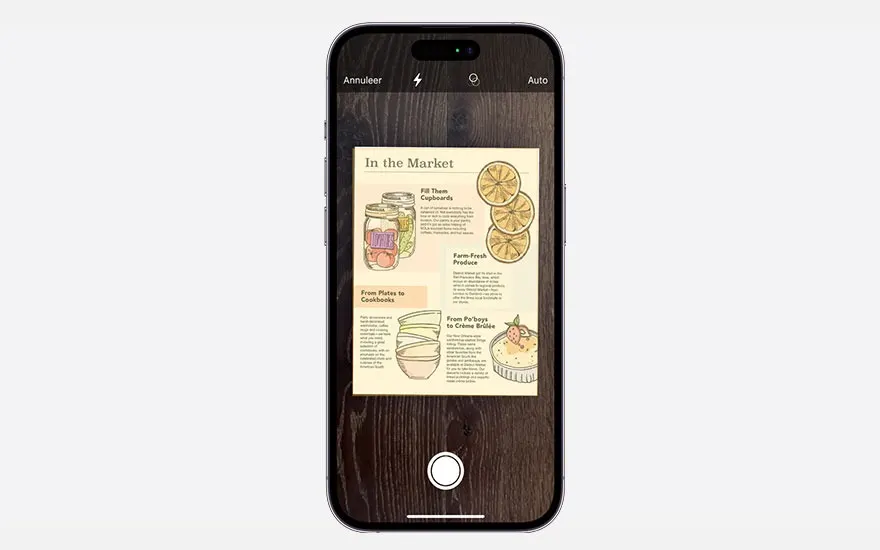 Un smartphone affiche un document avec des illustrations de nourriture. L'écran est marron foncé, avec des icônes blanches.