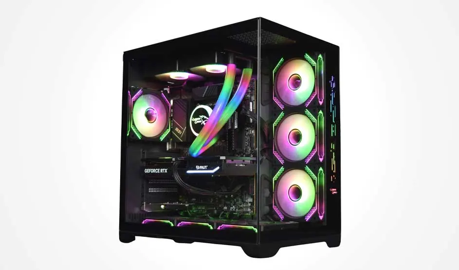 A glass-sided PC case with RGB fans and liquid cooling shows a powerful gaming rig, glowing in rainbow colours on a white backdrop.