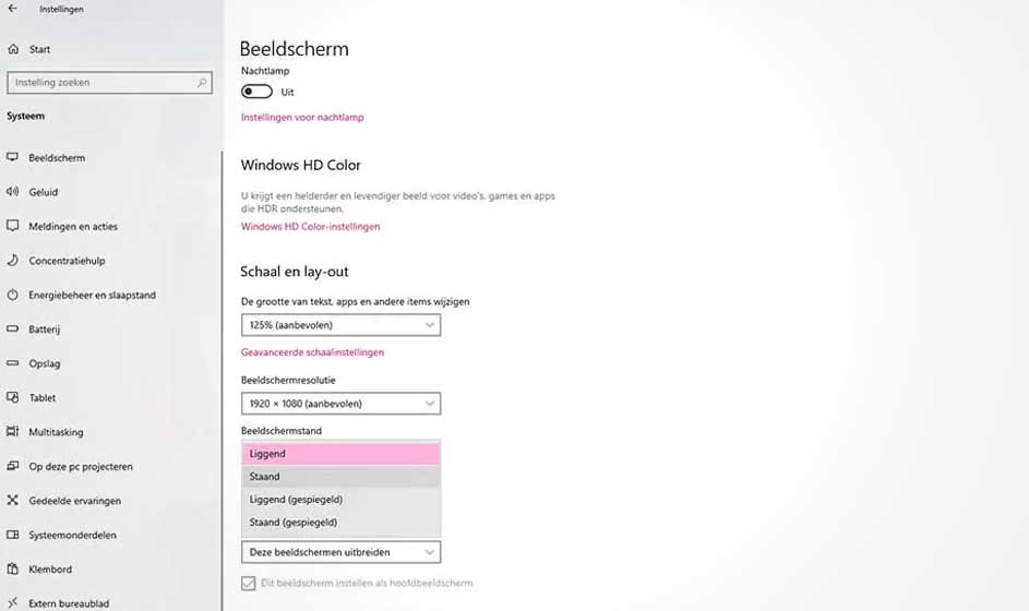 Windows-instellingen tonen een schermmenu met opties voor beeldscherm, nachtlamp, HD Color, schaal, resolutie en stand.