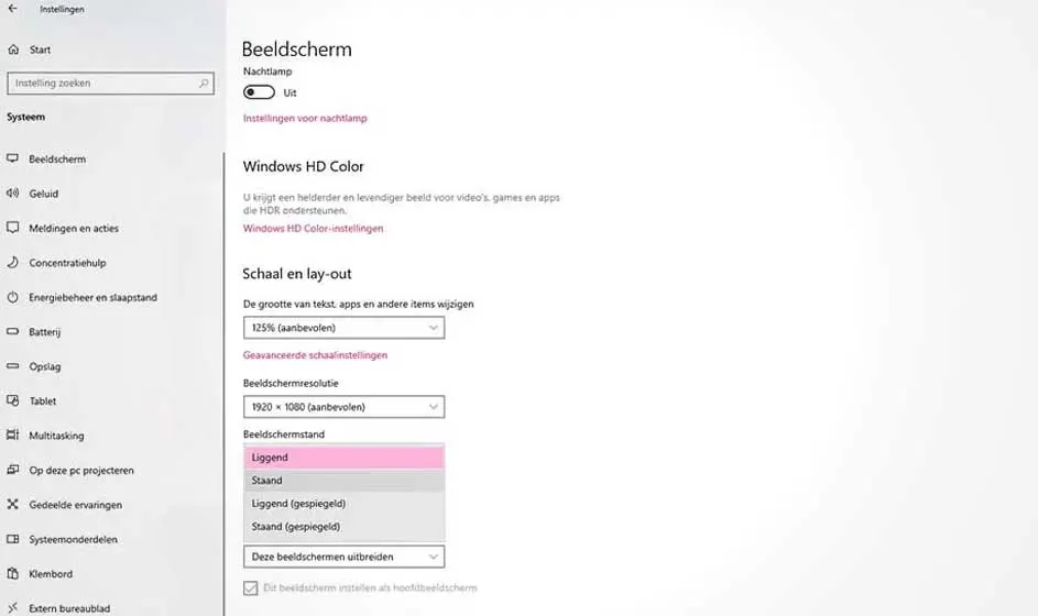 Windows-instellingen tonen een schermmenu met opties voor beeldscherm, nachtlamp, HD Color, schaal, resolutie en stand.