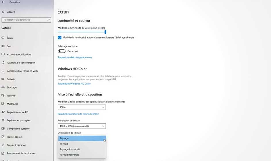 Paramètres d'écran Windows affichant les options de luminosité, d'échelle et d'orientation. Le mode paysage est mis en évidence.