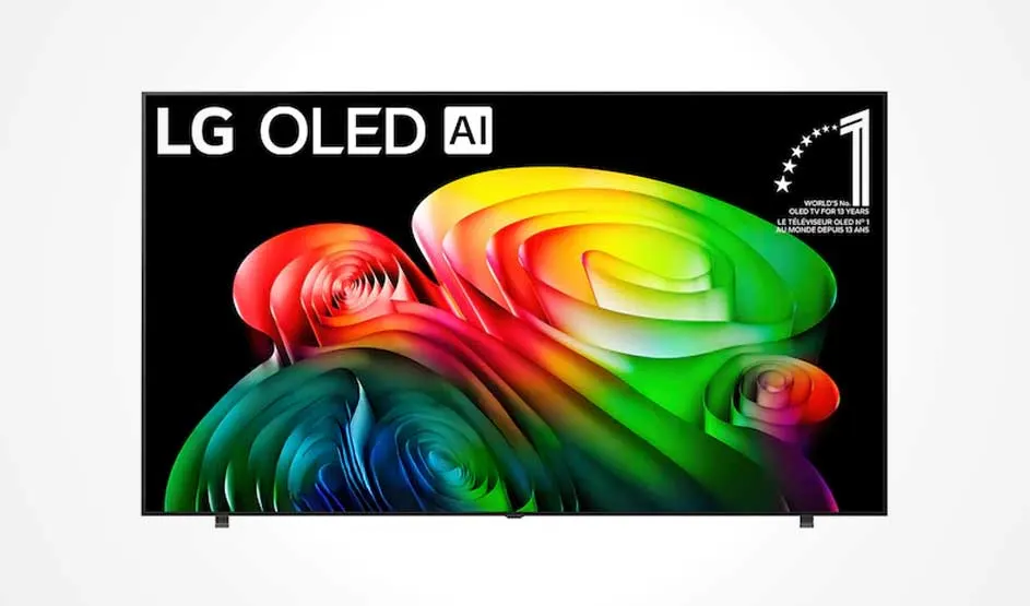 Un écran LG OLED affiche des formes abstraites colorées sur fond noir, dans une publicité vive et lumineuse.