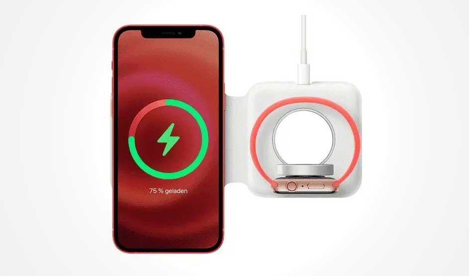 Een rode telefoon toont 75% batterij, naast een wit oplaadstation met een horloge erop.