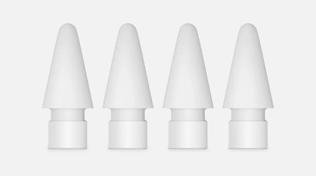 Quatre embouts blancs pour stylet numérique, alignés sur fond clair. Forme conique avec base cylindrique.