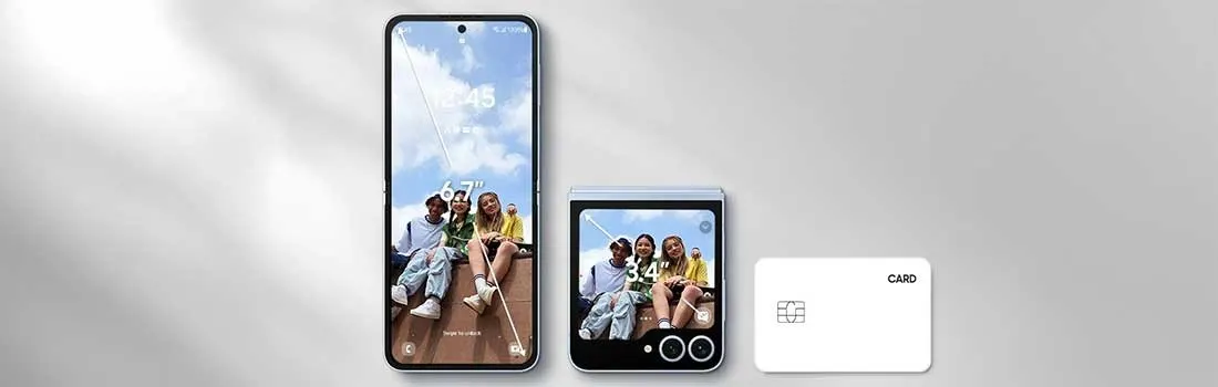 Two phones, one folded, next to a white card on gray.