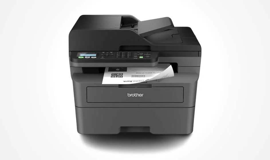A compact black Brother printer stands against a white background. It features a scanner, control panel, paper tray, and a sheet emerging from the front.