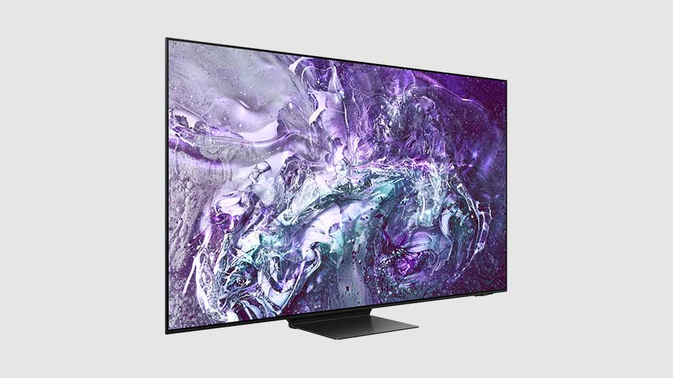 Een platte tv met een zwart scherm en paarse, witte en grijze patronen, staat op een zwarte voet.