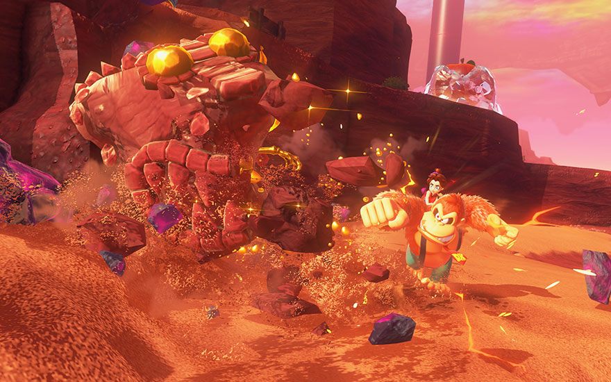 Donkey Kong staat in een roze kristalgrot met gouden lichteffecten, omringd door rotsformaties en glinsterende edelstenen overal.