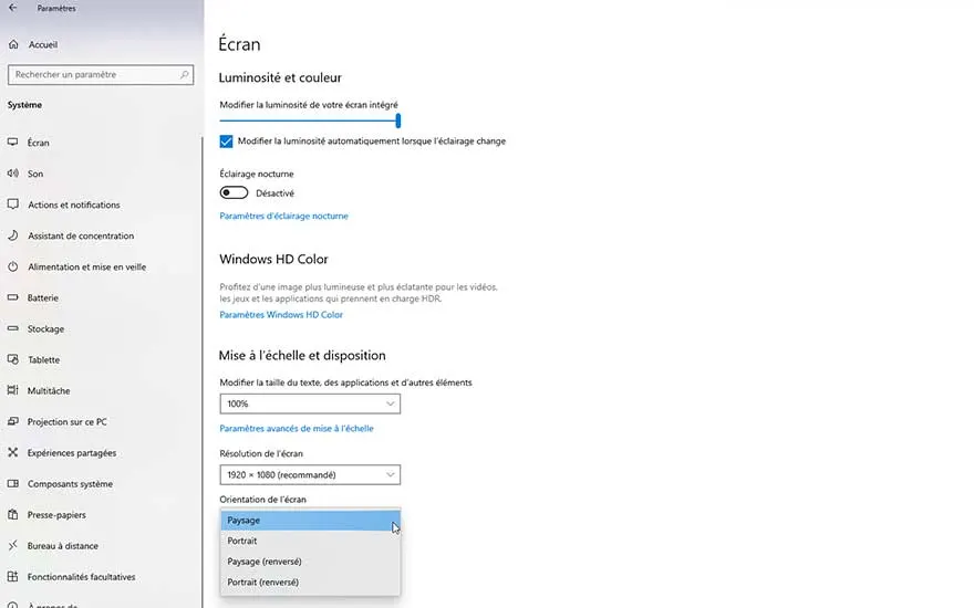 Paramètres d'écran Windows affichant les options de luminosité, d'échelle et d'orientation. Le mode paysage est mis en évidence.
