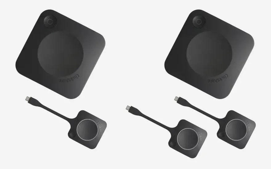 Two ClickShare base units, each with two matching USB-C buttons, illustrating a solution for larger collaborative teams.