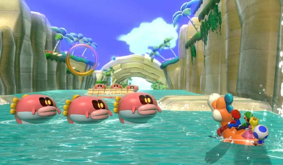 Turquoise water with three pink fish and a raft with four characters. Cliffs, plants and blue sky in background.