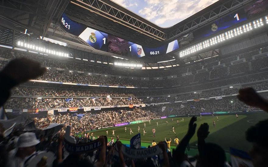 Stadionzicht vanuit tribune tijdens voetbalwedstrijd met scorebord en duizenden toeschouwers in moderne arena