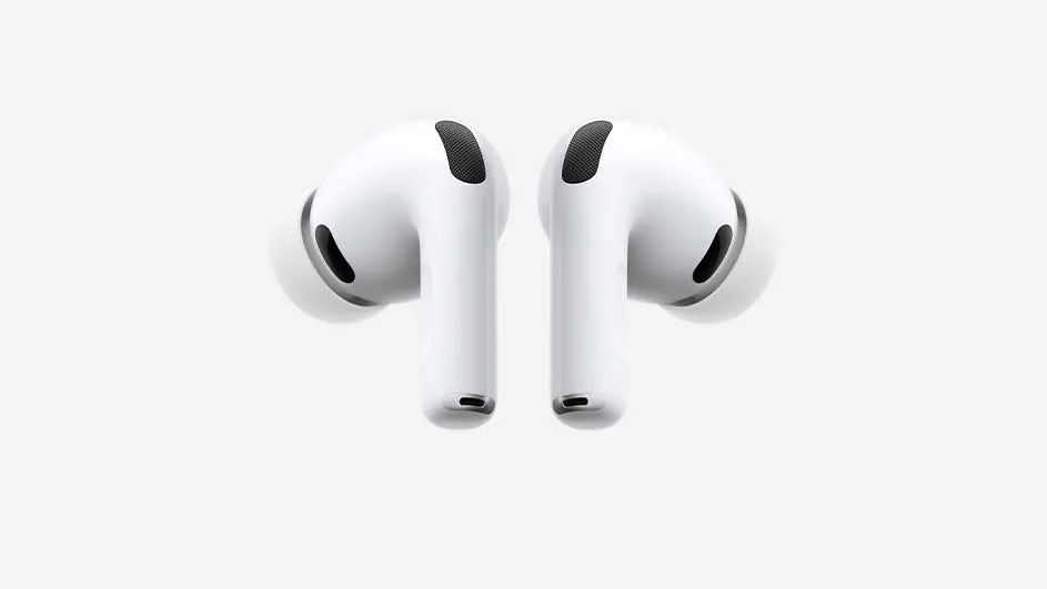 Close-up of two white wireless earbuds with silicone tips and subtle black speaker grilles, shown symmetrically against a clean light grey background.