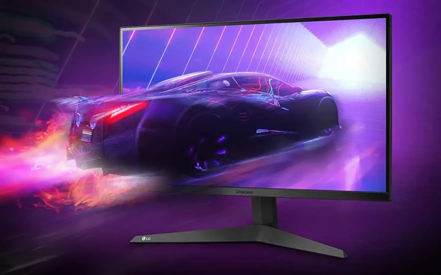 Een zwarte LG monitor toont een auto in beweging tegen een paarse achtergrond met neon lijnen.