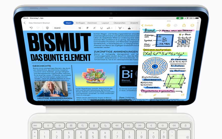 Un iPad posé au-dessus d’un clavier blanc affiche une présentation allemande sur le bismuth, avec titre, photos et schémas.