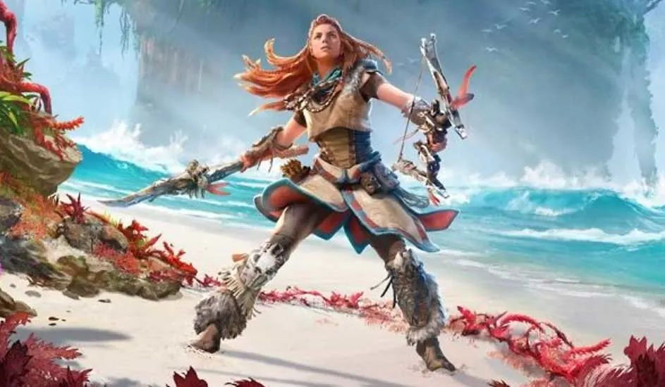 Ceci est un jeu vidéo. Une chasseuse aux cheveux roux, équipée d’un arc et d’une lance, se tient sur une plage tropicale entourée de plantes vives et mer.