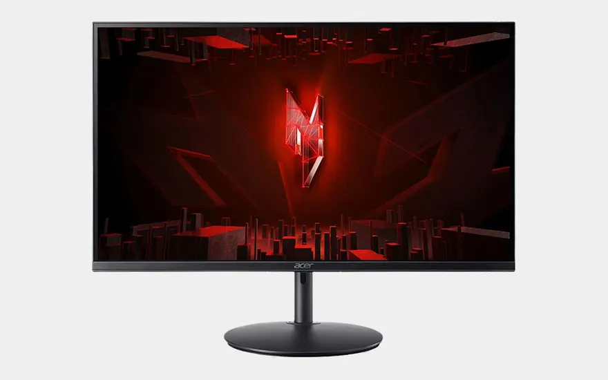 Un moniteur gaming Acer avec un paysage urbain cyberpunk rouge dramatique, logo cristal lumineux au centre et support noir.