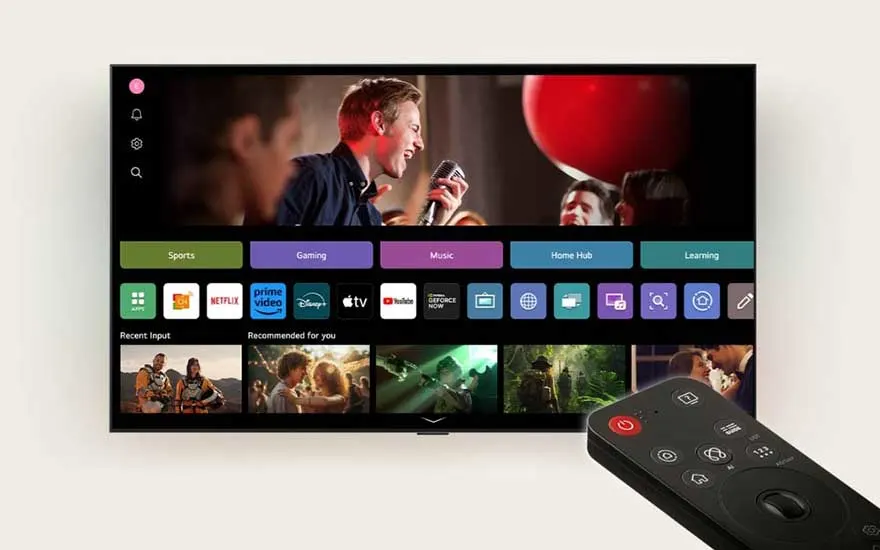 Un téléviseur LG intelligent affiche un menu coloré de services de streaming, une télécommande noire est visible au premier plan.