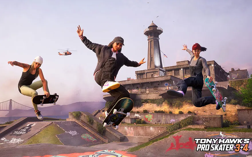 Drie skateboarders springen gelijktijdig in de lucht bij Alcatraz met een vuurtoren op de achtergrond. Tony Hawk's Pro Skater 3+4 gameplay.