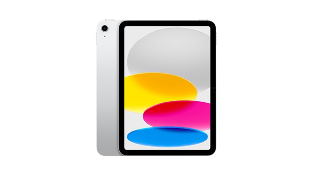 Tablette argentée avec écran affichant des formes colorées : jaune, rose et bleu.