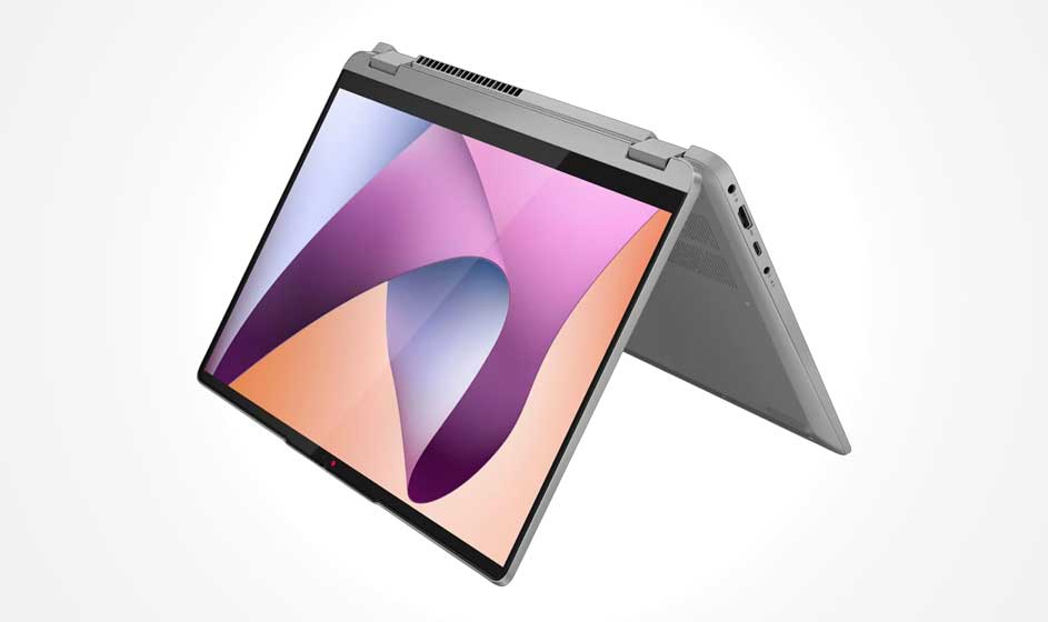Een grijze 2-in-1-laptop staat in tentstand op een witte achtergrond, met een kleurrijk scherm vol paarse en roze vormen.