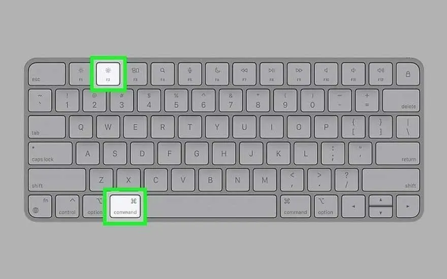 Grey keyboard on a grey background. The keyboard has function keys, number keys, letter keys, and command keys.