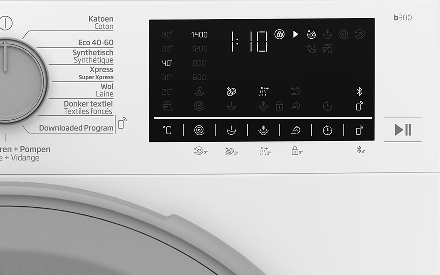 Panneau de commande blanc d'une machine à laver avec écran numérique affichant 1:10 et divers symboles de réglage.