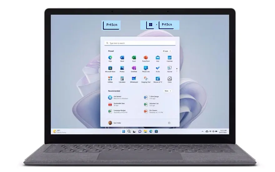 Un ordinateur portable gris ouvert affiche le menu Démarrer de Windows sur un fond d'écran par défaut.